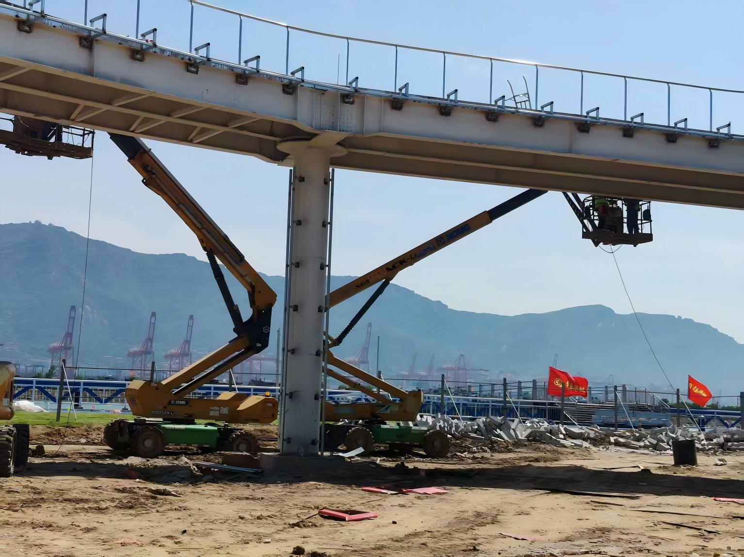盐雾里搭起 “空中环线”！NG官网高空作业平台奋战连岛景区建设